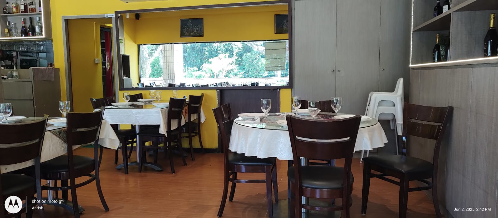Round and rectangular tables set for guests